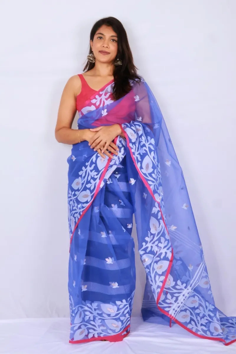 Royal blue and pink Phulia muslin art silk Jamdani saree with floral motifs and striking contrast border Noolagam