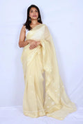 Butter yellow Chanderi Chikankari saree from Lucknow with delicate white floral hand embroidery Noolagam