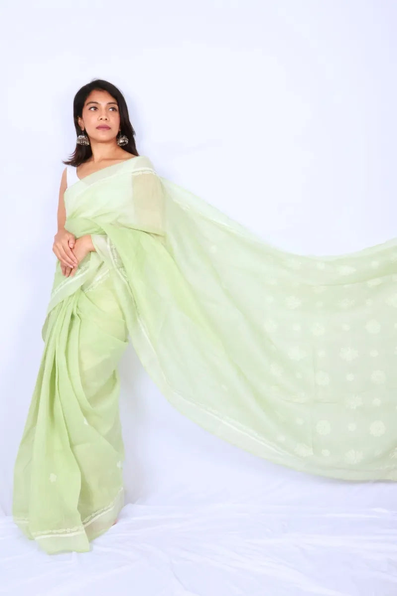 Mint green Chanderi Chikankari saree from Lucknow with white floral hand embroidery and detailed pallu Noolagam_3