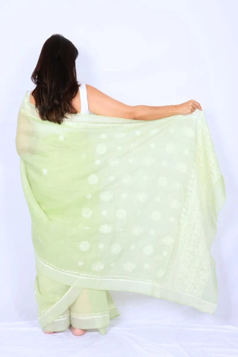Mint green Chanderi Chikankari saree from Lucknow with white floral hand embroidery and detailed pallu Noolagam_4