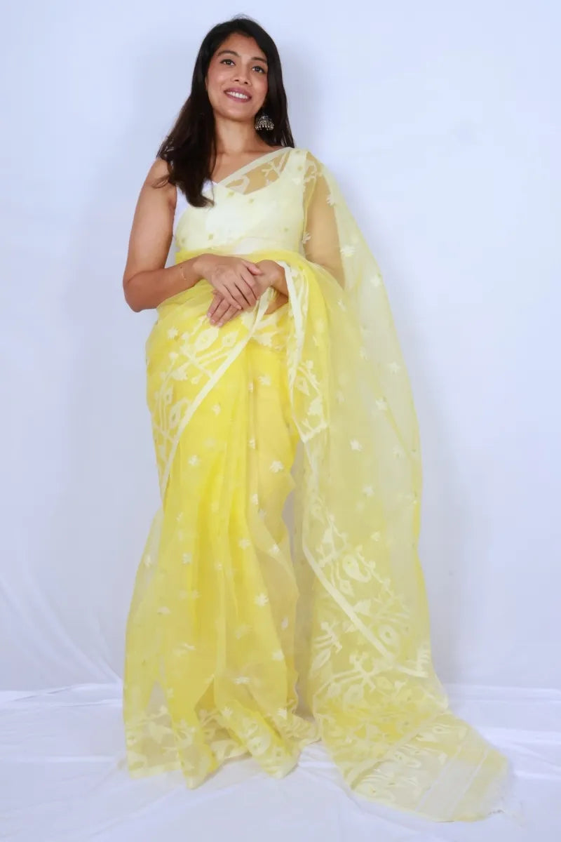 Lemon yellow Phulia muslin art silk Jamdani saree with delicate woven motifs handwoven in West Bengal Noolagam