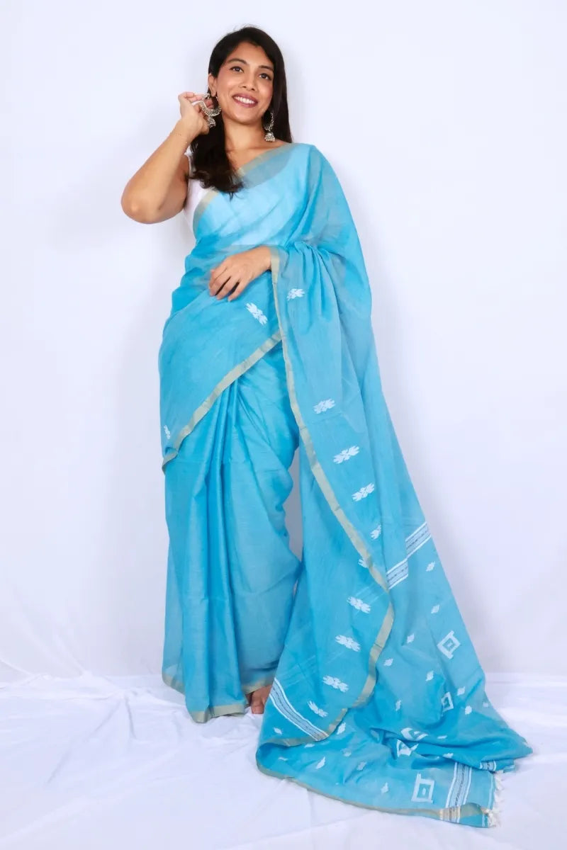 Sky blue khadi cotton saree from Phulia handwoven with delicate white motifs and contrasting border Noolagam