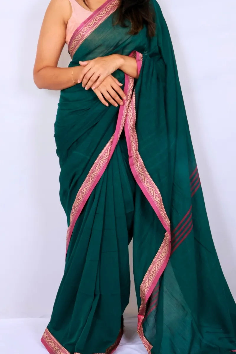 Green khadi cotton saree from Phulia handwoven with vibrant pink border and woven detailing Noolagam_2