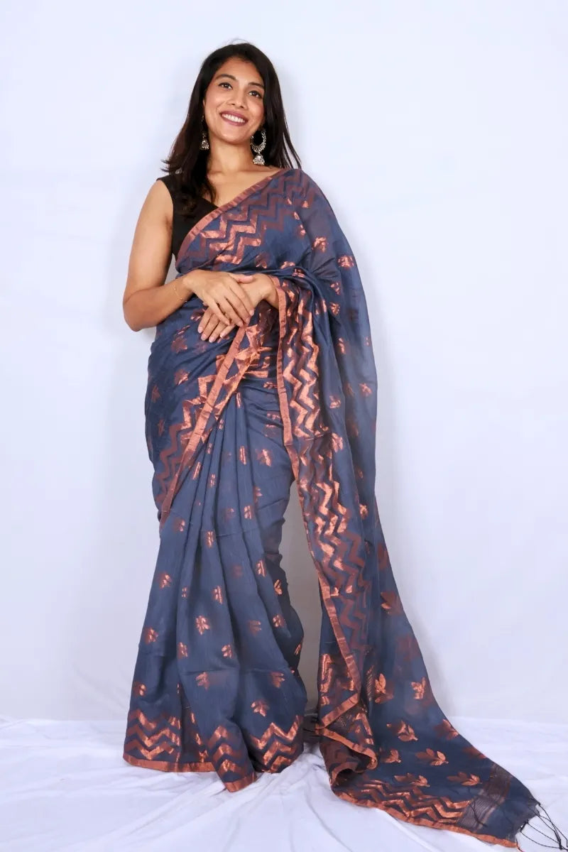 Charcoal blue and copper Phulia handloom mercerized cotton saree with copper motifs and zigzag woven border Noolagam