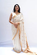 Bishnupuriinspiredpurekhadicottonsareeinivoryandmustardwithwovenpallu_Noolagam