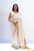 Bishnupuriinspiredpurekhadicottonsareeinivoryandmustardwithwovenpallu_Noolagam