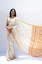Bishnupuriinspiredpurekhadicottonsareeinivoryandmustardwithwovenpallu_Noolagam_5