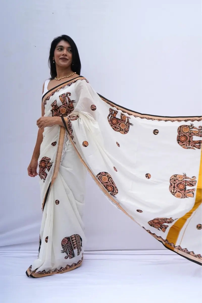 KeralakasavusareewithKalamkariappliqueinivoryblackandmustard_Noolagam_5