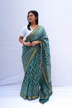 MaheshwaricottonsilkDabuhandblockprintedsareeinsagegreenwithzariborder_Noolagam
